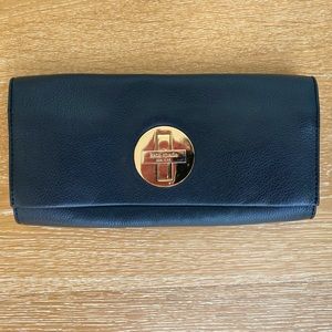 Kate Spade black shoulder bag with gold chain and buckle.  Great condition!